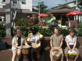 Expats and locals playing the drums in Belize – Best Places In The World To Retire – International Living